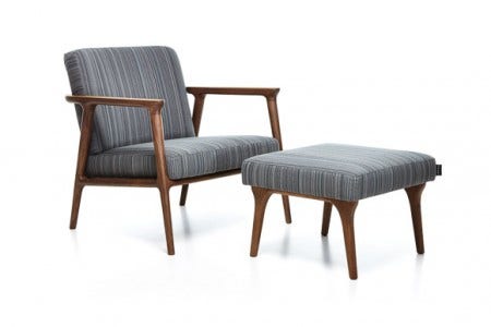 The Zio Lounge Chair, and footstool, have solid oak frames and are available in a curated collection of fabrics and leathers. 