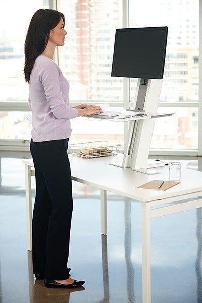 Transform your work space! Designed with a large platform that seamlessly blends into your work surface the QuickStand Workstation is available in two sizes and comes in black or white.