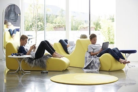 Designed in 1969, the Welle Lounge Seating System creates its own landscape. Available in a colorful range of fabrics.