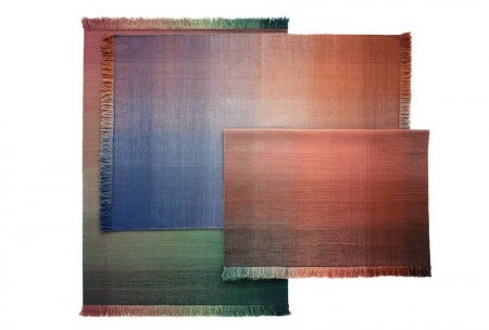 Designer Begüm Cana Özgür emphasizes: "this is a handmade flat-weave rug that generates an incredible and well-rounded diffusion of color. The surface releases a sense of tranquillity and well-being that is balanced by the penetrating vibration of colors."