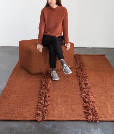 An artisanal flat-weave made in India, the Mía rug is a Dhurrie created by joining three pieces, individually dyed, to obtain a worn, lived-in effect. Made of 100% New Zealand Wool.