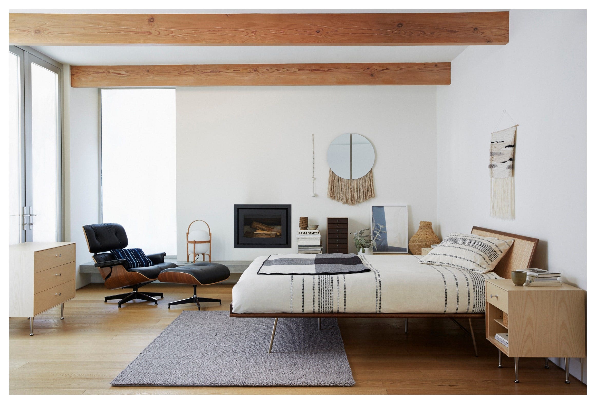 Nelson Thin Edge Bed and Dresser in a bedroom with Eames Lounge Chair