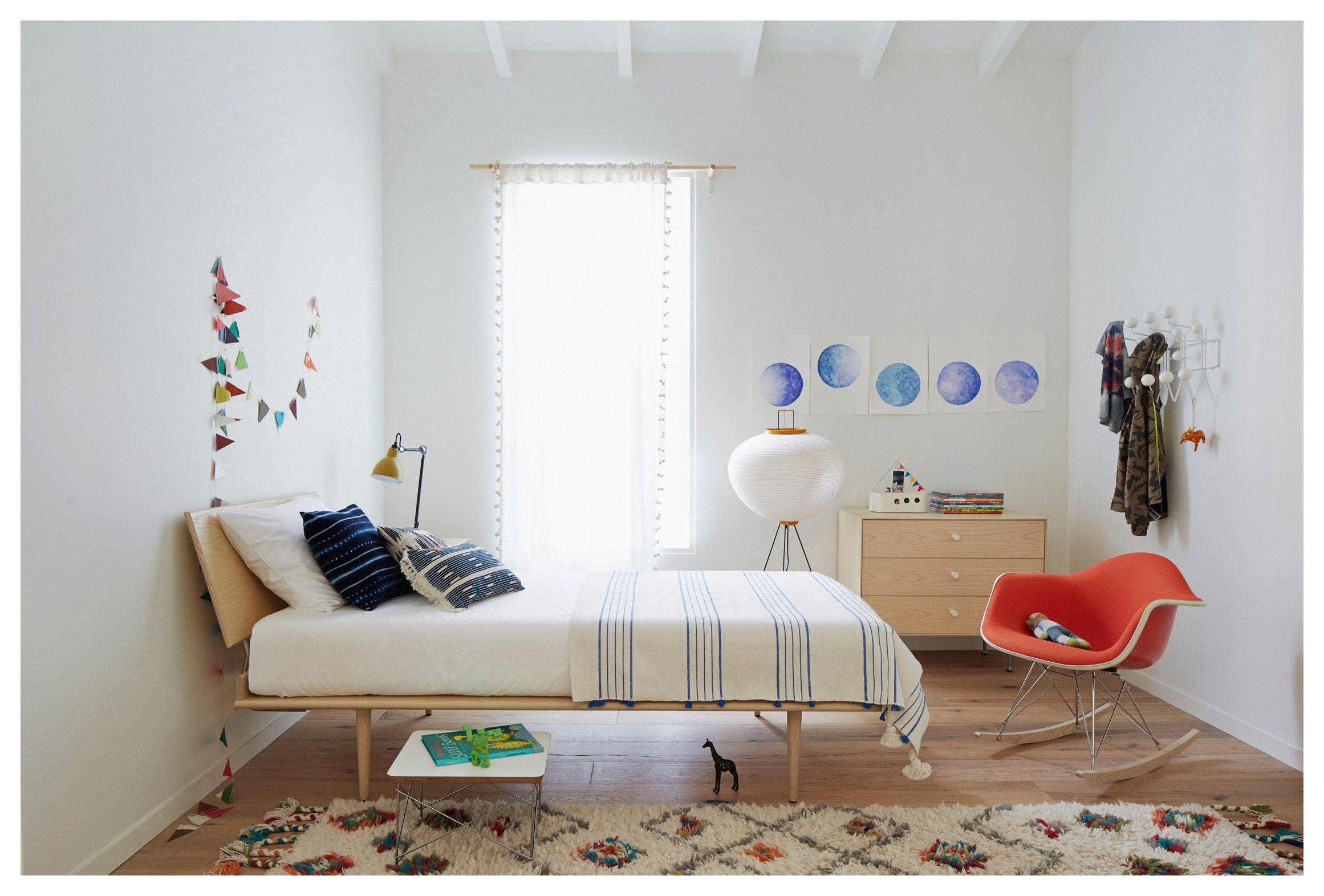 Nelson Thin Edge Bed in a children's room with Eames Rocker and Nelson Bubble Lamp
